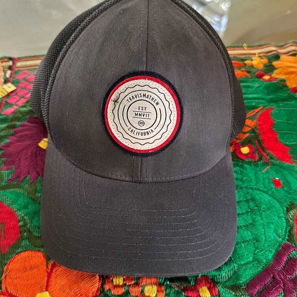 Travis Mathew , the patch hat